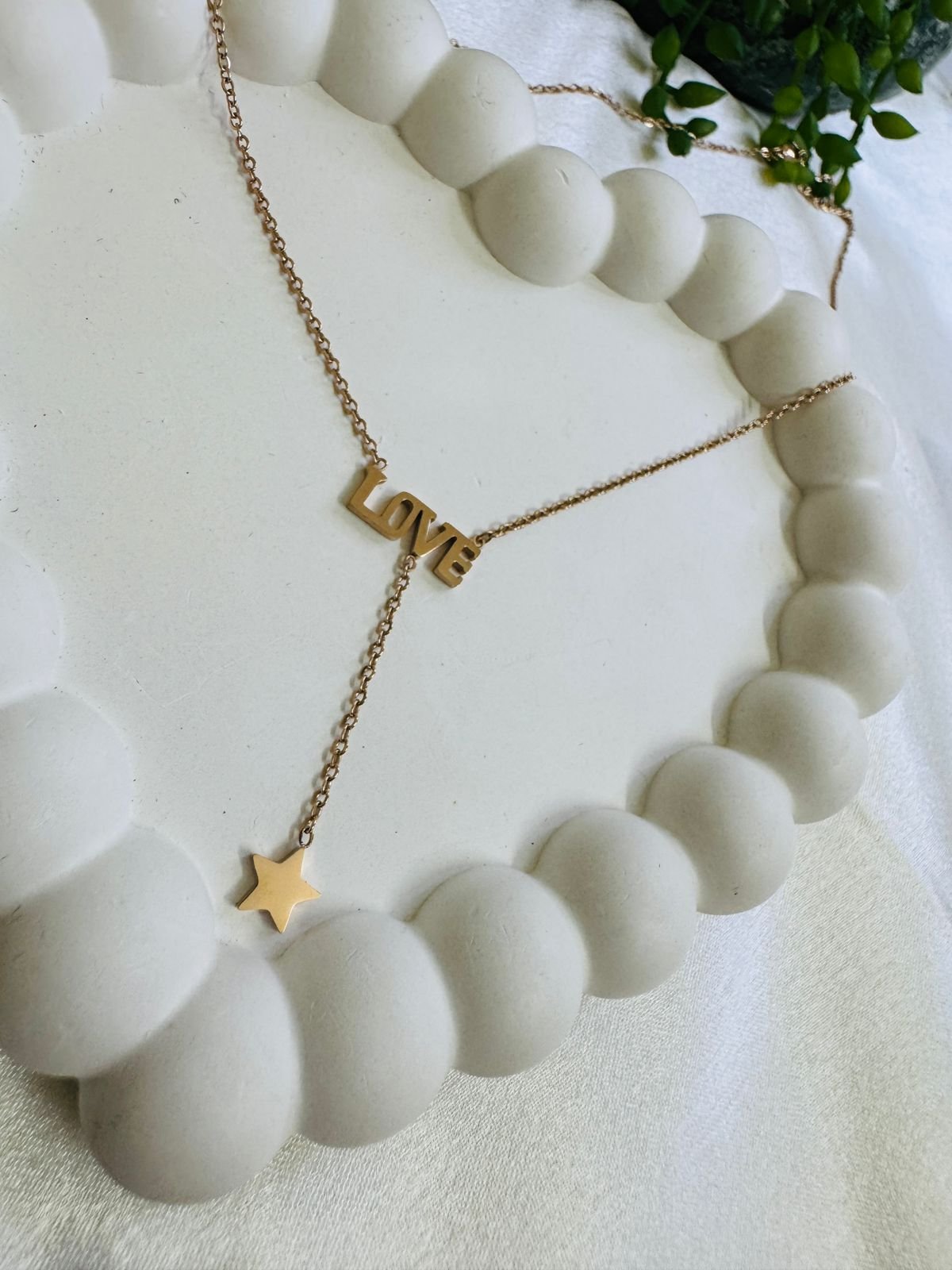 gold-toned "LOVE" letter Y- chain with a star charm. - Image 2