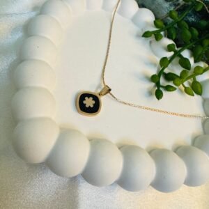 rose-gold-plated-chain-with-a-black-and-white-clover-pendant