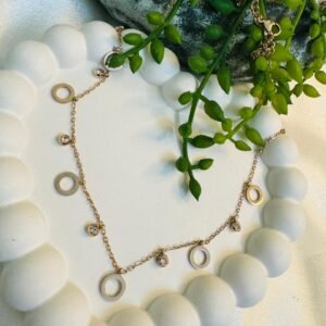 rose-gold-tone-chain-featuring-circular-links-and-cubic-zirconia-stones