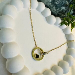 gold-plated-stainless-steel-anti-tarnish-circle-pendant-chain-with-a-black-heart-charm