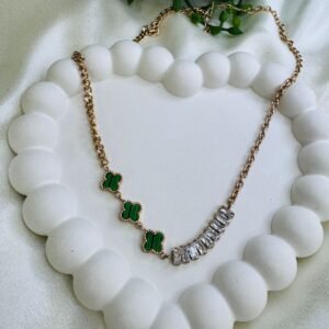 rose-gold-plated-van-cleef-arpels-style-necklace-featuring-malachite-clover-motifs-and-baguette-cut-cubic-zirconia-stones