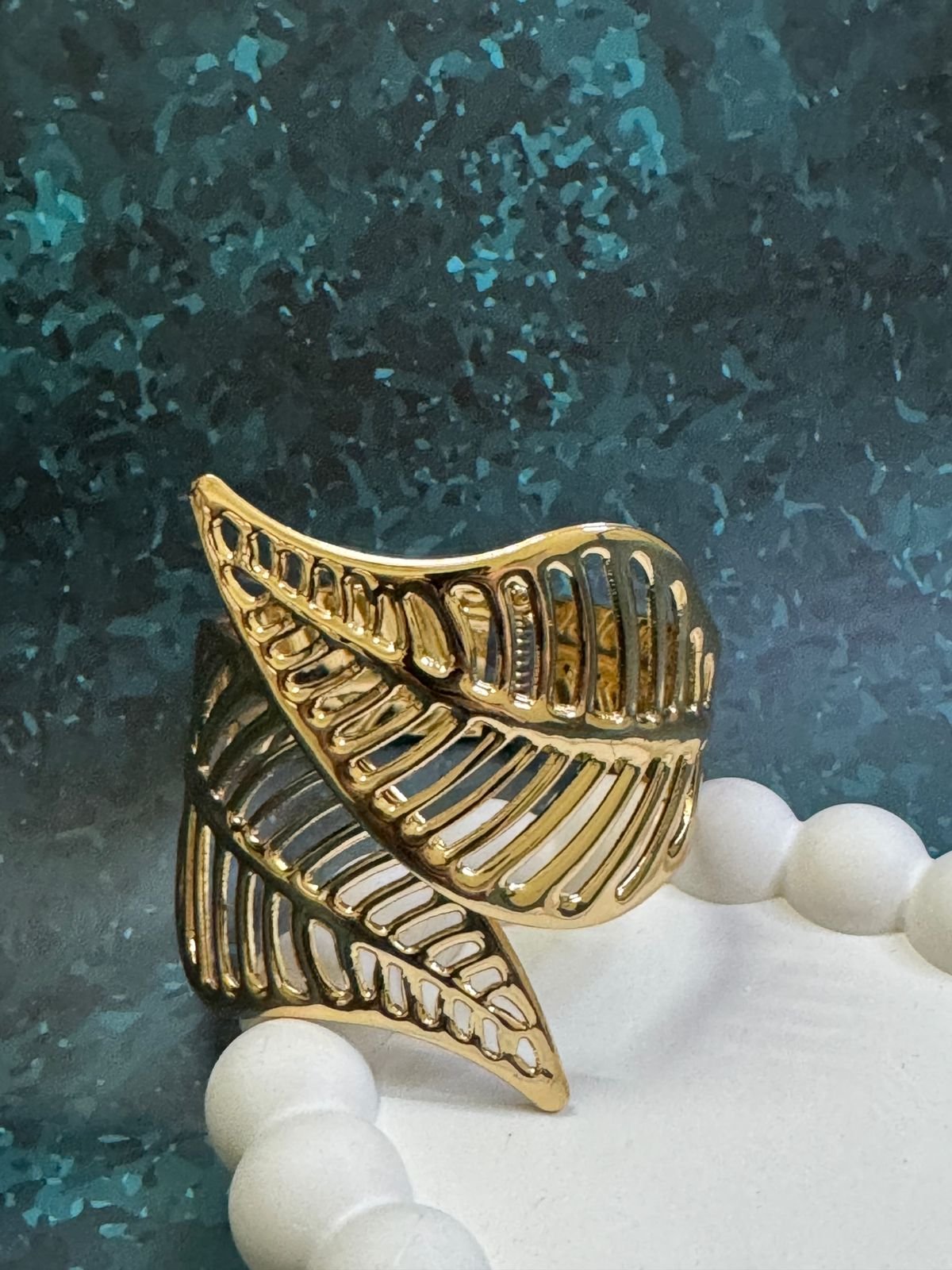 Nature-inspired, high-polish 18K gold-plated leaf cuff bracelet with an open, flexible design. - Image 2