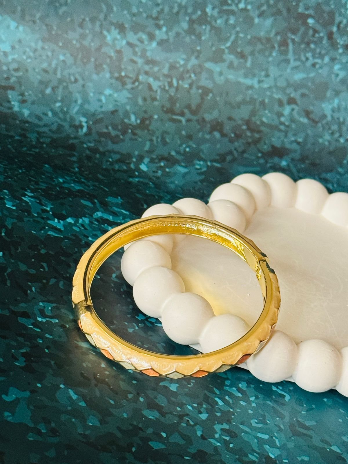 Gold-plated bangle featuring a multi-colored enamel rhombus, or checkered, pattern. - Image 2