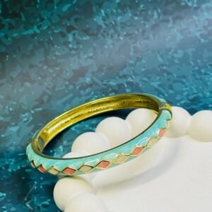 turquoise-and-coral-enamel-bangle-with-a-geometric-pattern