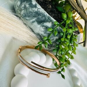 stainless-steel-rose-gold-plated-american-diamond-studded-nail-inspired-bracelet