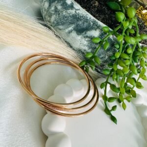 plain-rose-gold-bangles-likely-made-from-brass-or-a-similar-alloy-designed-for-casual-or-daily-wear
