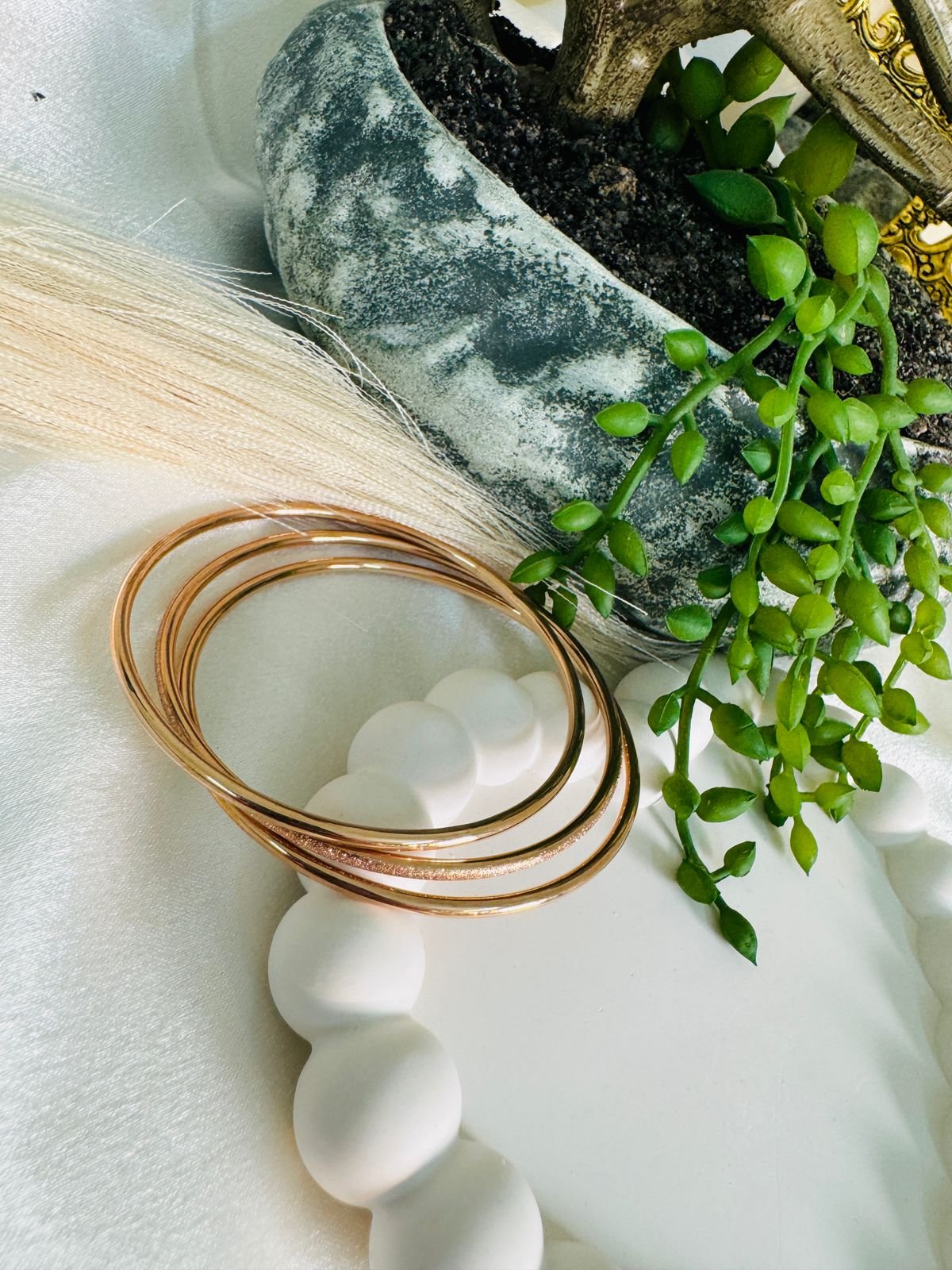 Plain, rose gold bangles, likely made from brass or a similar alloy, designed for casual or daily wear.