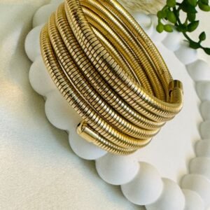 gold-toned-coil-bracelet-also-commonly-known-as-a-multi-layer-wrap-or-spiral-bangle