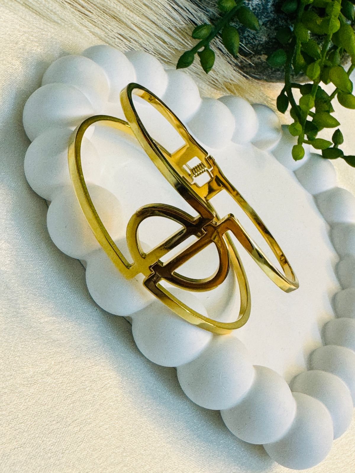 A double-band cuff or hinged bangle with an "H" initial centerpiece and a clasp closure. - Image 4