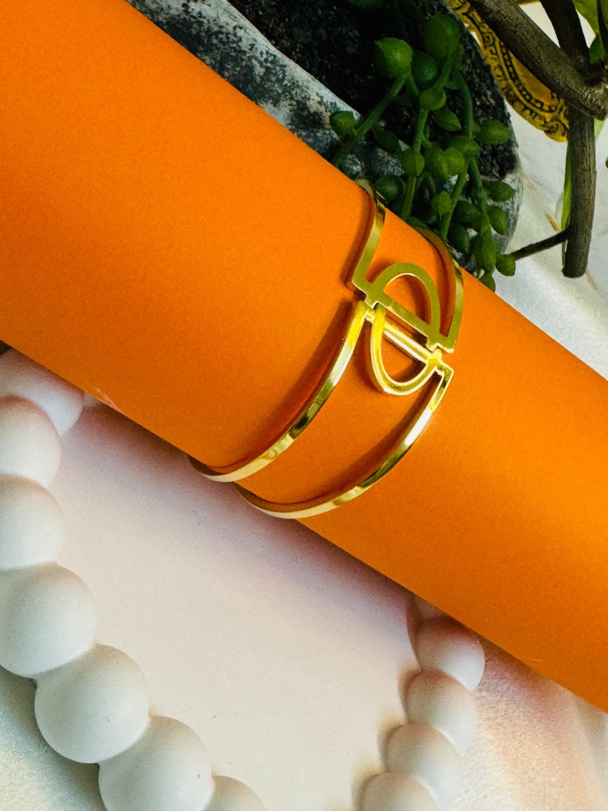 A double-band cuff or hinged bangle with an "H" initial centerpiece and a clasp closure. - Image 3