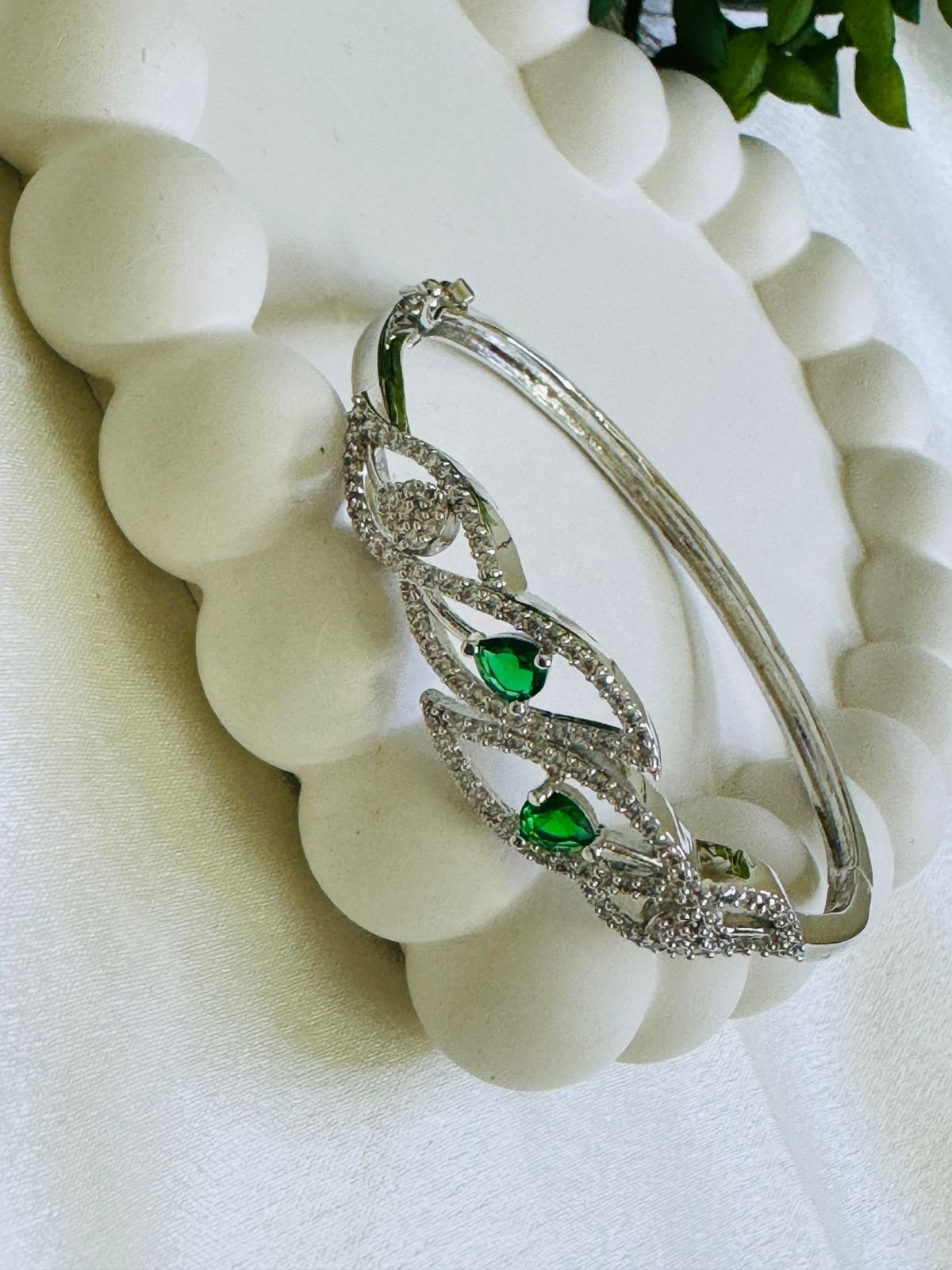 Priyaasi Green Leaf American Diamond Silver-Plated Bracelet.