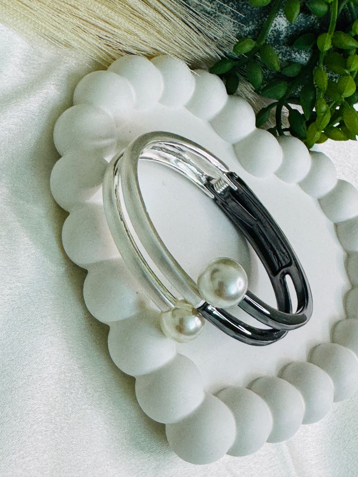 Dual-toned hinged cuff bracelet crafted in metal with faux pearls. - Image 3