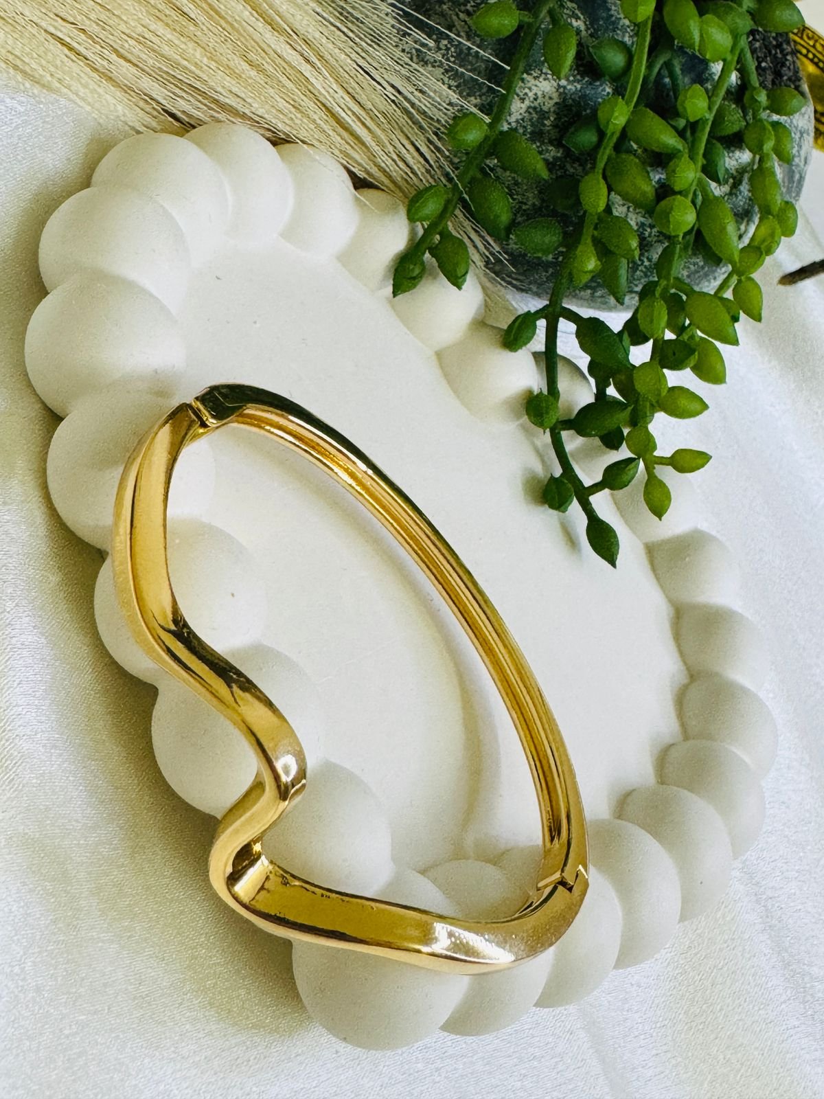 Gold-toned, wavy cuff bracelet. - Image 3