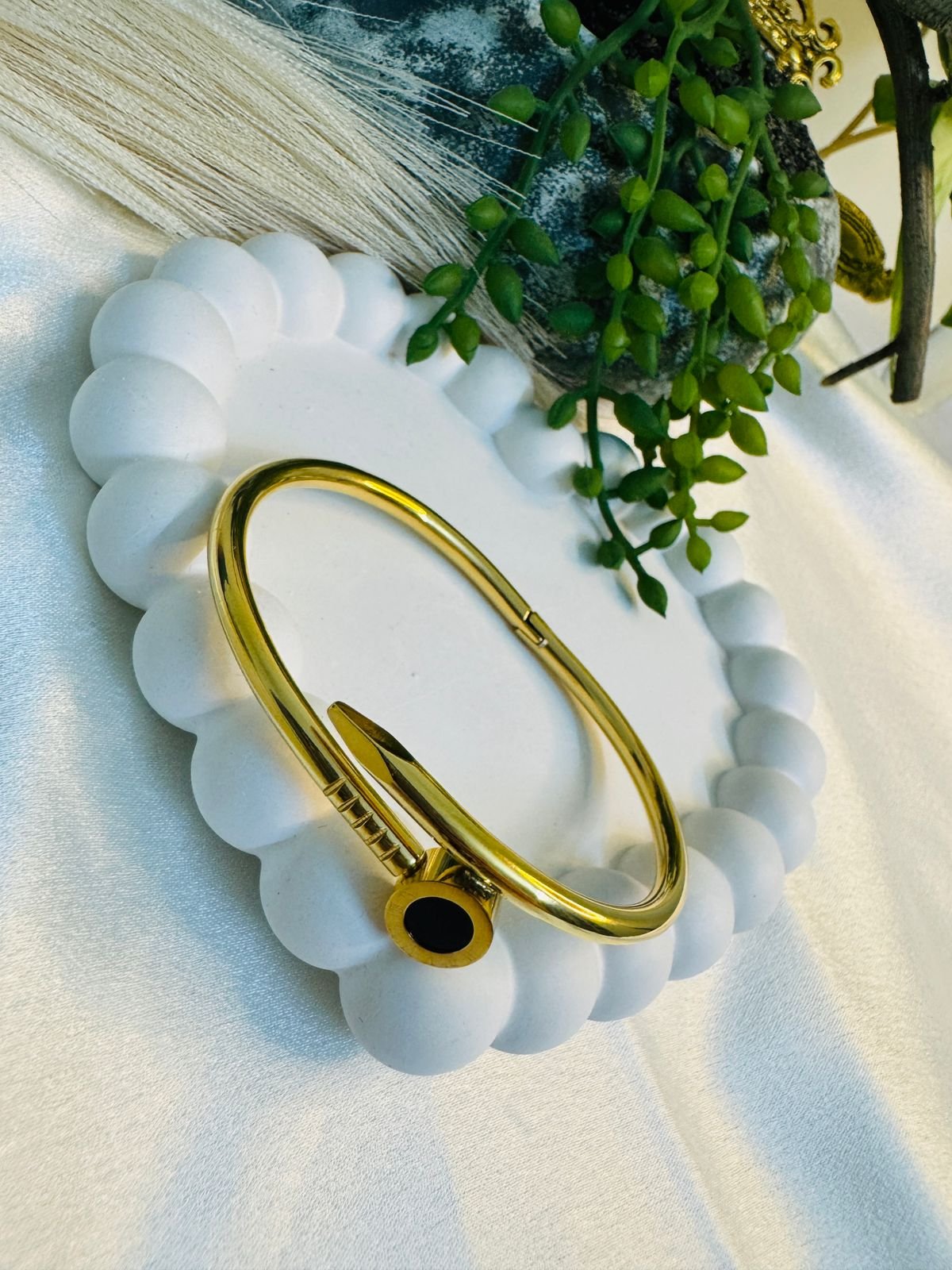 18k Gold-plated stainless steel Roman numeral kada bracelet with an anti-tarnish finish.