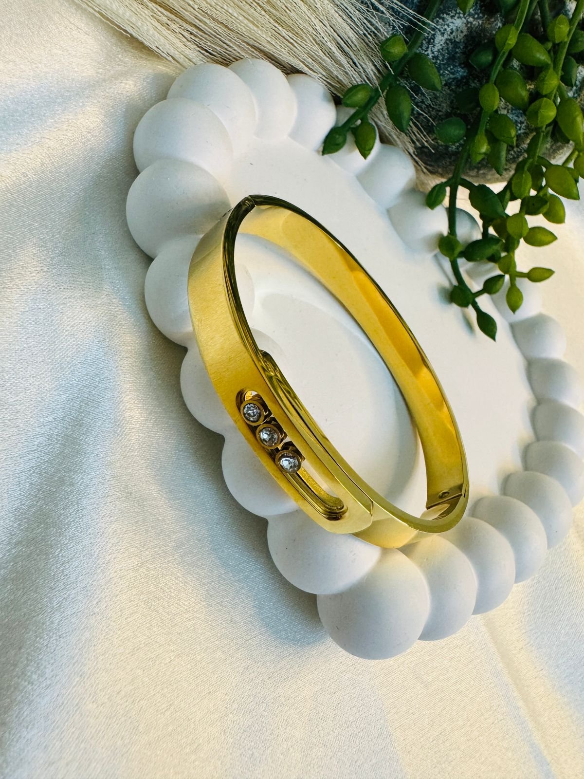 18 k gold-plated stainless steel bangle bracelet with three floating cubic zirconia stones, Anti-tarnish finish. - Image 2