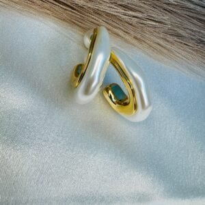 gold-toned hoop earrings with white faux pearls.